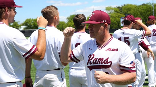 Head Coach Kevin Leighton interacting with players